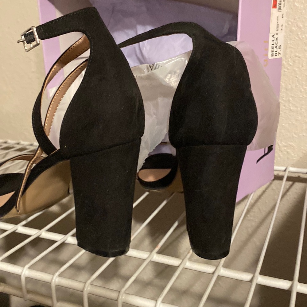 Women’s black open toe high heels.only wore a few times. In great condition.